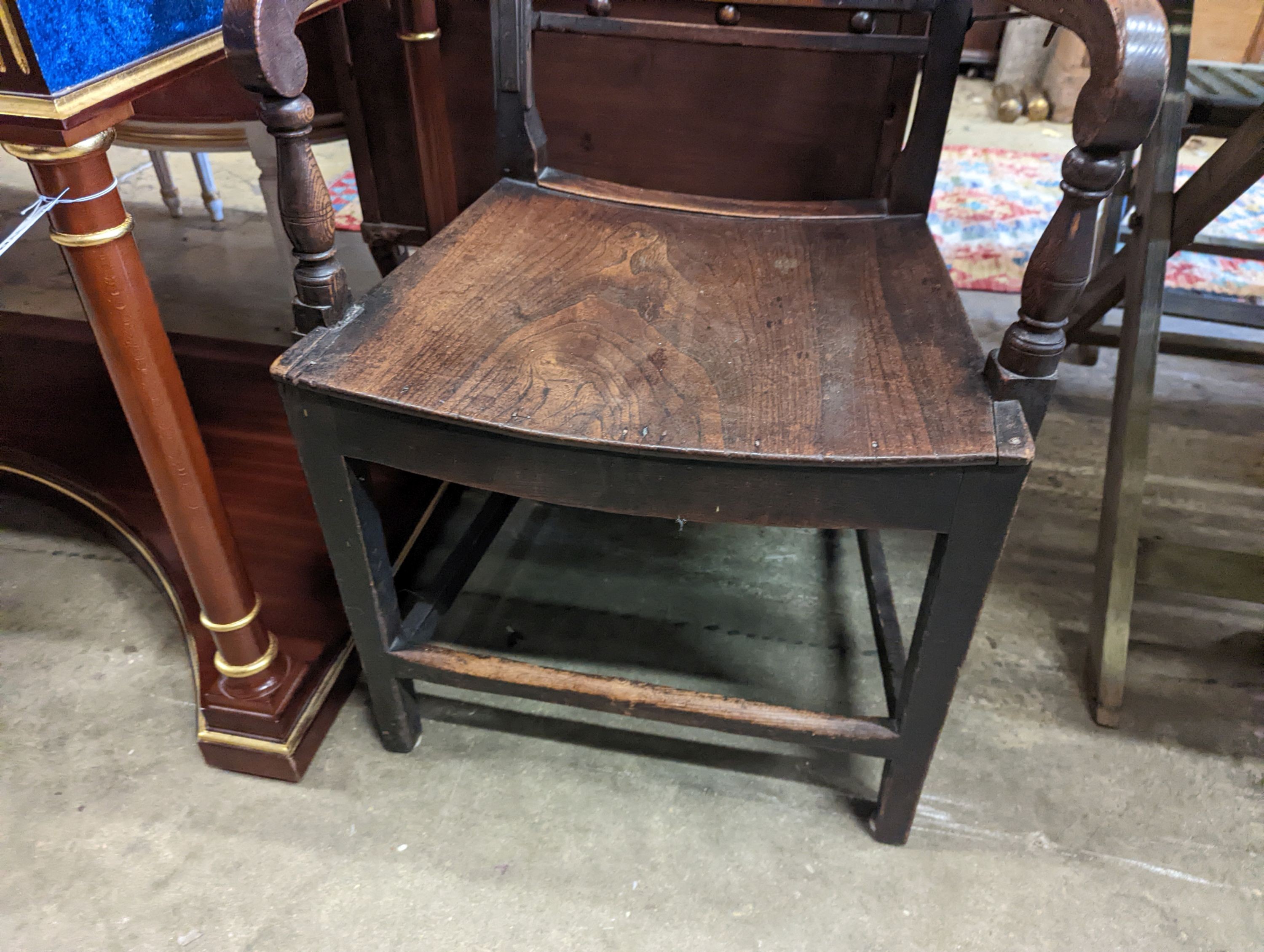 A Regency provincial ash and elm reclining wood seat elbow chair, width 54cm, depth 44cm, height 112cm